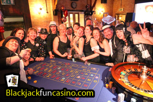 A group having lots of fun at the casino tables in Nottingham